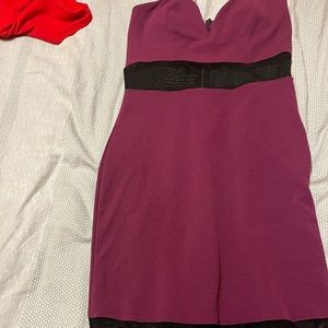 Strapless Charlotte Russe fitting knees length dress with mesh middle and bottom